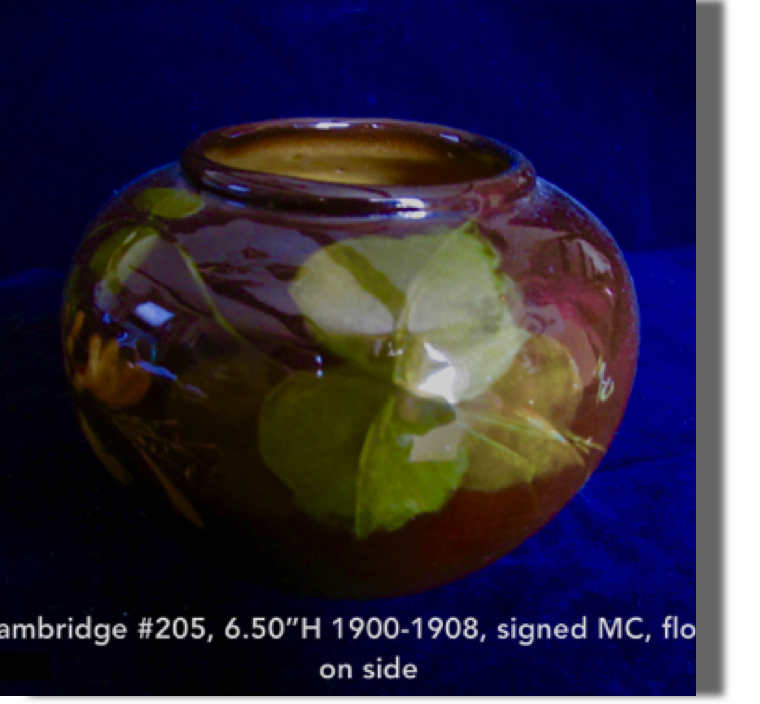 Cambridge #205, 4.50" high, 3" at mouth, 6.50" wide, 1900-08, signed MC, marked CAP, very nice painting, poor photo