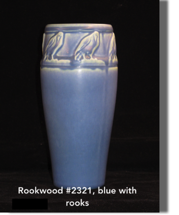 #2321 blue vase with rooks, 7.75" high, 2.75" opening with lip, 3.75 diameter