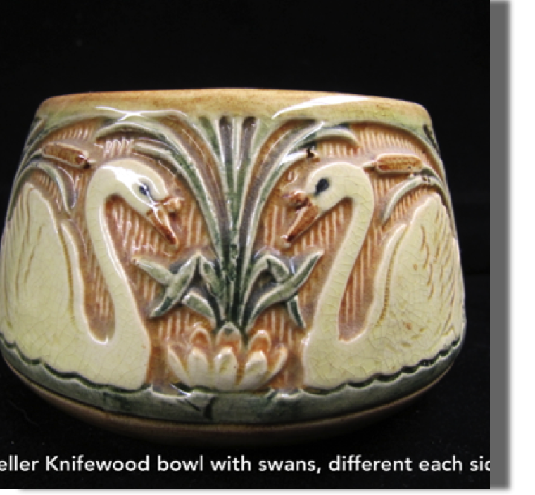 Knifewood introduced in the late teens of Weller's production, a line also modeled by Rudolph Lorber showing off his skill at modeling in detail.  With the higher gloss this pot would also be known as Selma.  Pot is 3.5" high by 6" wide,