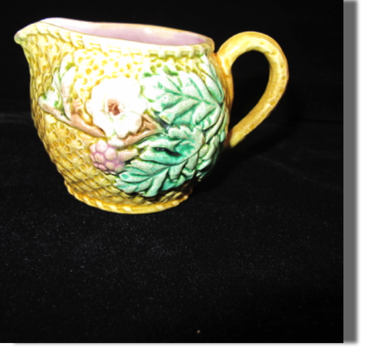 Pineapple creamer with pink inside, believe Etruscan